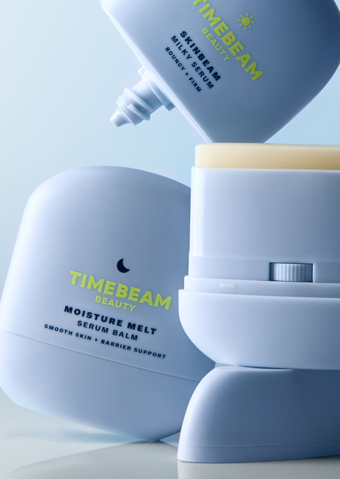 Close-up of open bottles of TIMEBEAM skincare.