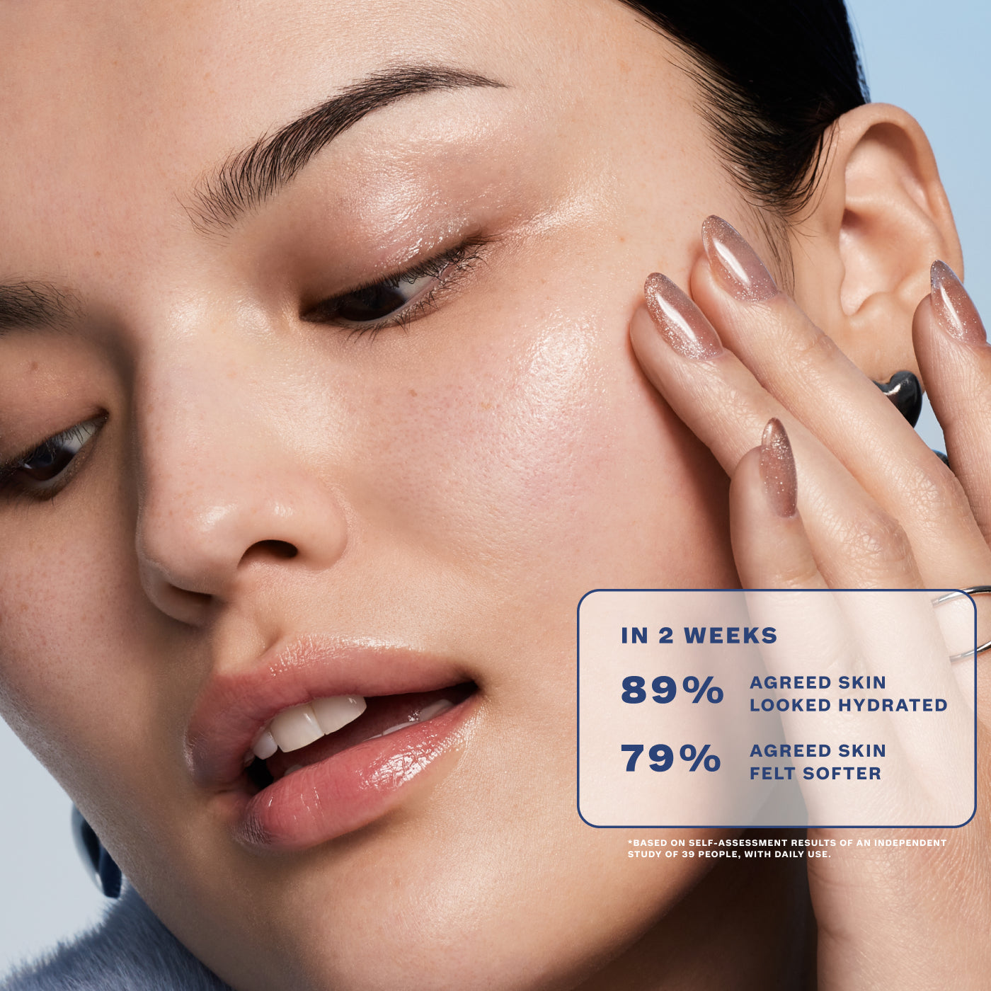 Close-up of woman's head, with the text "in 2 weeks, 89% agreed skin
looked hydrated, 79% agreed skin felt softer"