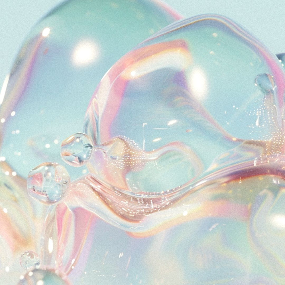 Iridescent bubbles with soft pastel hues of pink, blue, and violet.