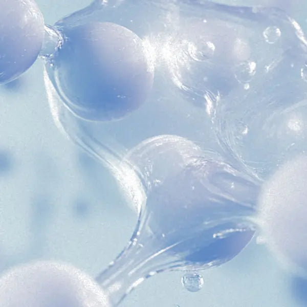 Close-up of translucent, gel-like structures in soft shades of blue and white.