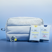 Light blue pouch with 'TIMEBEAM' branding, two packages of 'TIMEBEAM' supplements products, and a star-shaped charm on a light blue background.