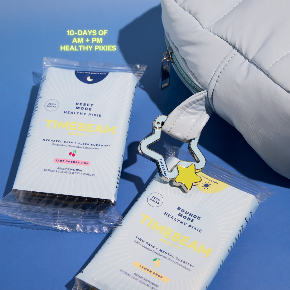 Two packets of 'TIMEBEAM' with a star-shaped keychain on a blue background