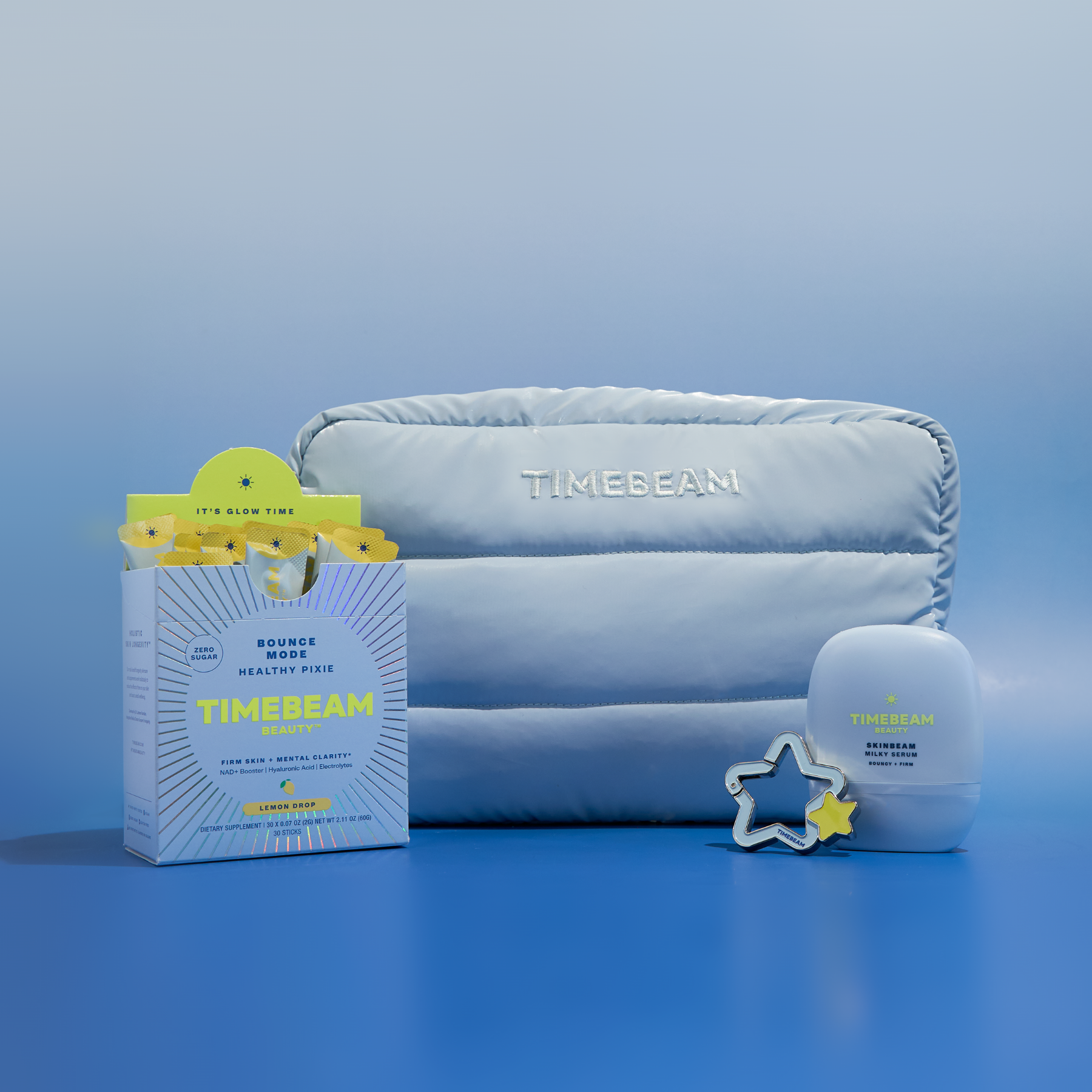 Blue bag, morning supplement, star carabiner, and serum