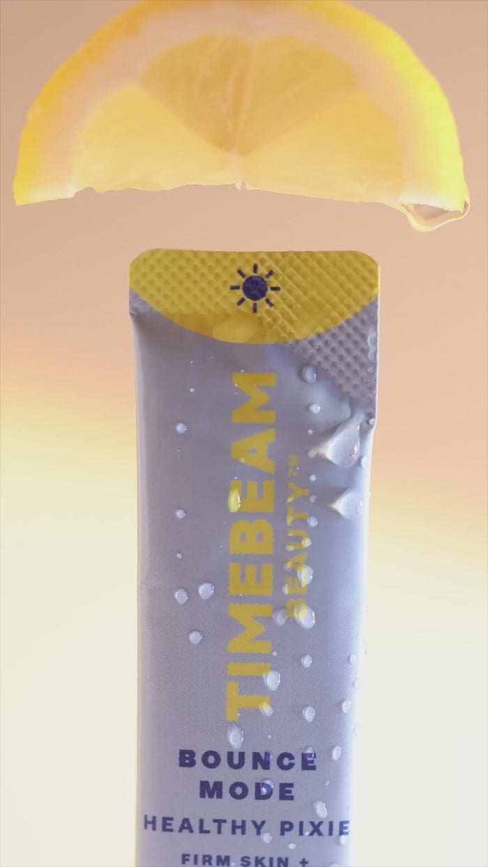 Video of a woman making and drinking a lemon drink with TIMEBEAM supplements.