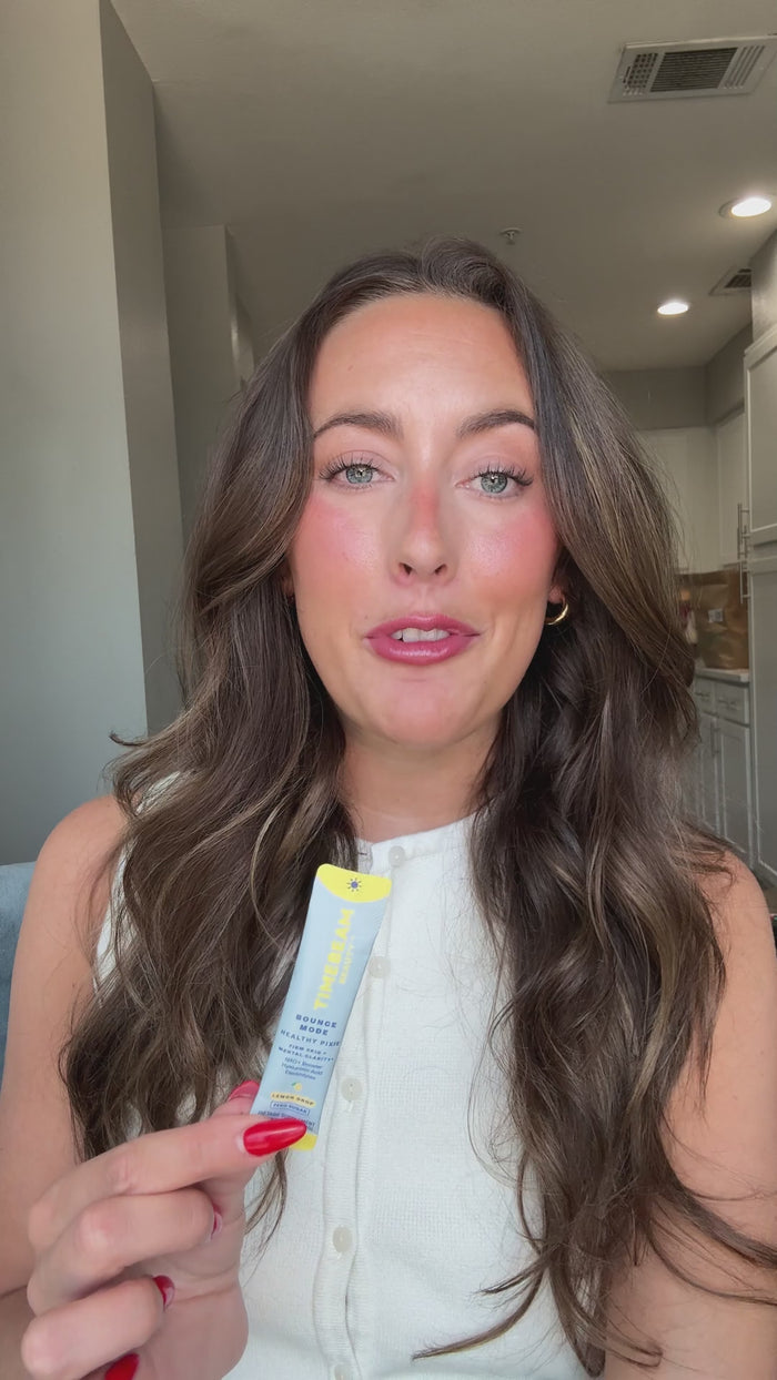 Video of a woman showing how TIMEBEAM supplements fit into her daily life. 