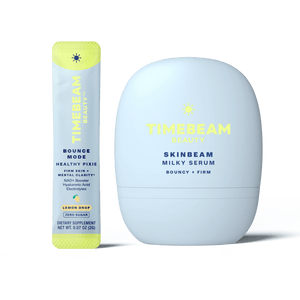 A bottle of TIMEBEAM Skinbeam milky serum next to a pouch of Bounce Mode supplements.