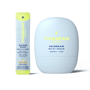 A bottle of TIMEBEAM Skinbeam milky serum next to a pouch of Bounce Mode supplements.