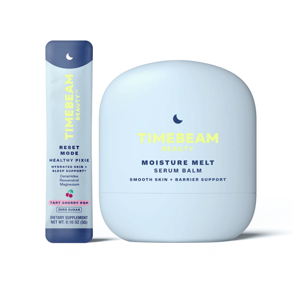 A bottle of TIMEBEAM Moisture Melt serum balm next to a pouch of Reset Mode supplements.
